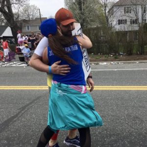 Lauren hugs her husband, Anthony, on the Boston Marathon course