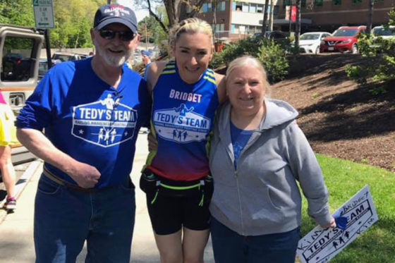 Bridget with her parents on a run through Boston